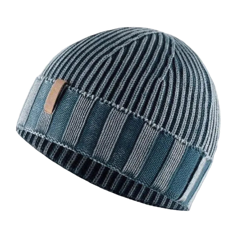 Unisex stickad mössa med retrodesign & sliten look, perfekt vintermössa för streetwear stil.