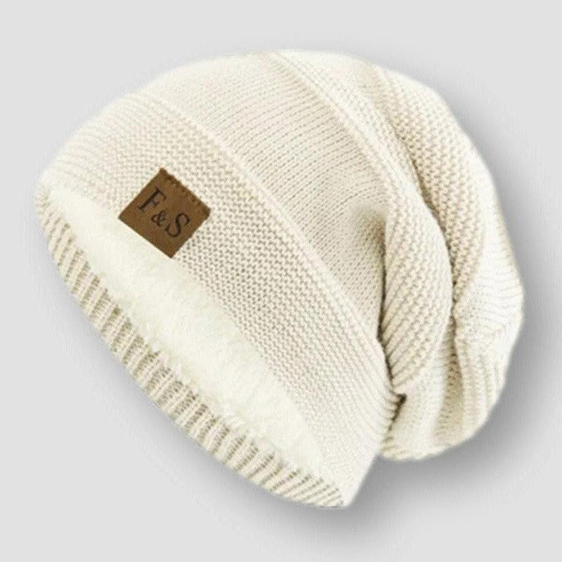 Varm och mysig unisex mössa med fleecefoder, idealisk för vinter och modeaccessoar.