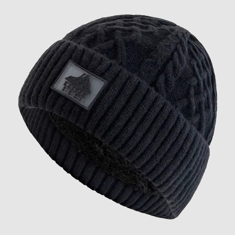Unisex mössa i stickat material, perfekt för kalla vinterdagar, bekväm passform