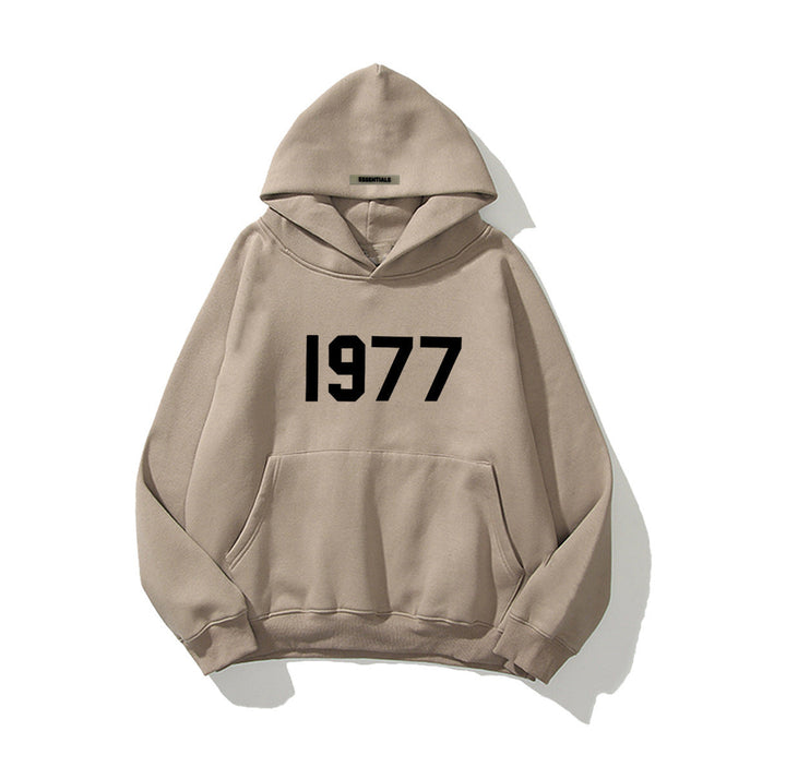 Retro hoodie i 1977-stil med raglanärm för unisex komfort, perfekt för streetwear mode.