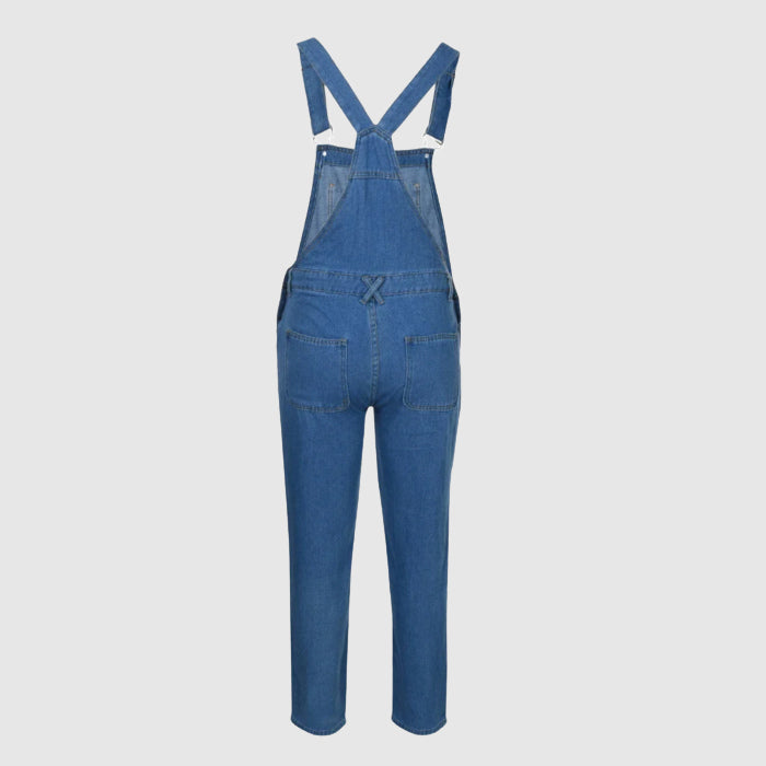 Unisex overall i denimblå, kombinerar komfort och funktionell design för en avslappnad streetwear-stil.