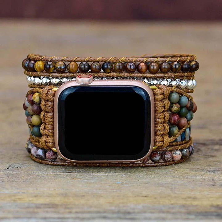Apple Watch-armband med unika tigeröga-kristaller. Ett vackert klockarmband.