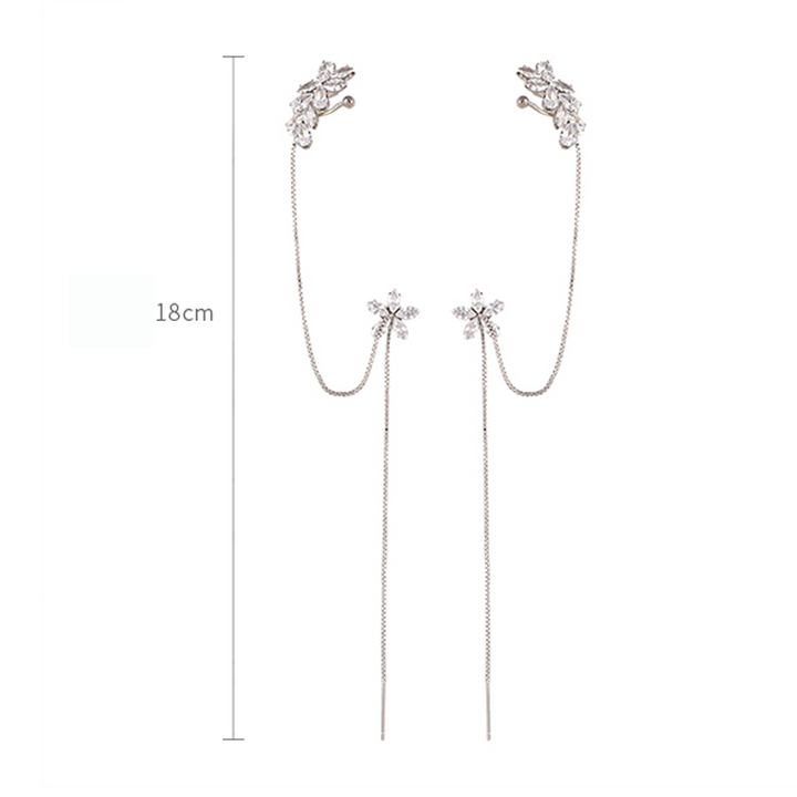 "Unisex tofs hängande örhängen med glänsande zirkoninlägg och dekorativ design, perfekta som hypoallergena accessoarer."