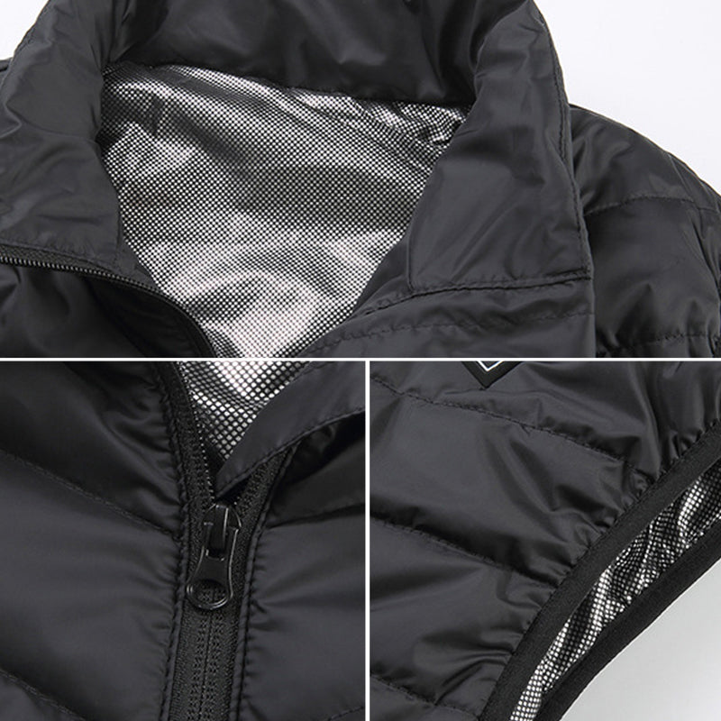 "Unisex uppvärmd väst för vinter, svart och blå. Lätt, bekväm, med snabba värmepaneler och långa batteritid."