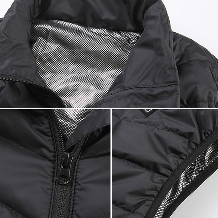 "Unisex uppvärmd väst för vinter, svart och blå. Lätt, bekväm, med snabba värmepaneler och långa batteritid."