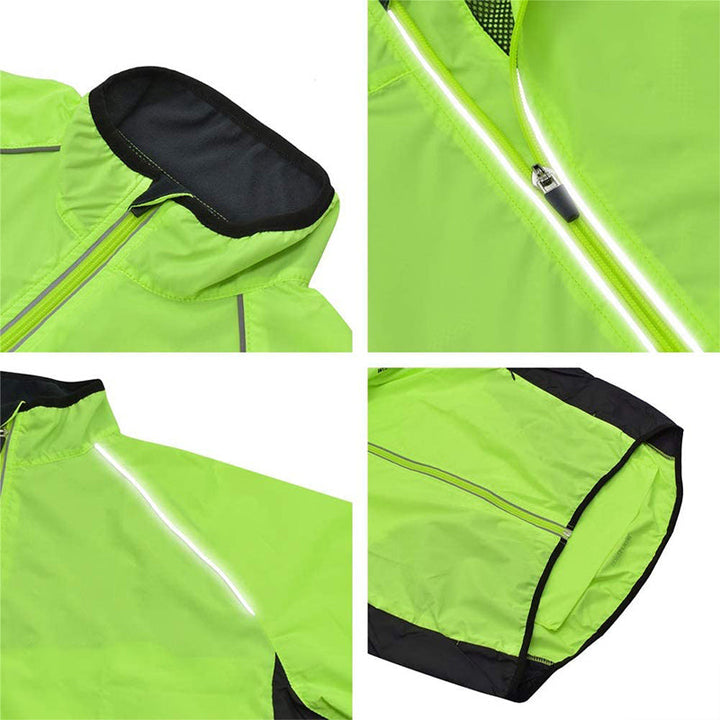 Unisex vattentät sport vindjacka i polyester, finns i flera färger som grön och orange, reflekterande detaljer.