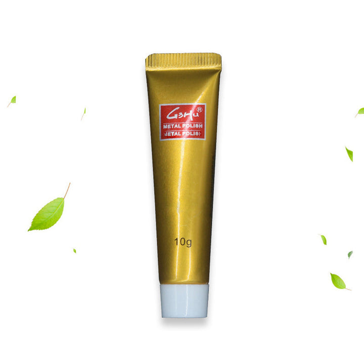 "Universal metallputs kräm för glansig yta, effektivt mot smuts och repor, lämplig för olika metaller, vit kräm i tub."