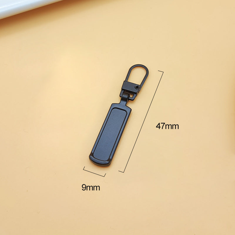 "Universalt avtagbart metallhandtag för dragkedjor, silver, perfekt för kläder och väskor, rektangulärt, robust design."