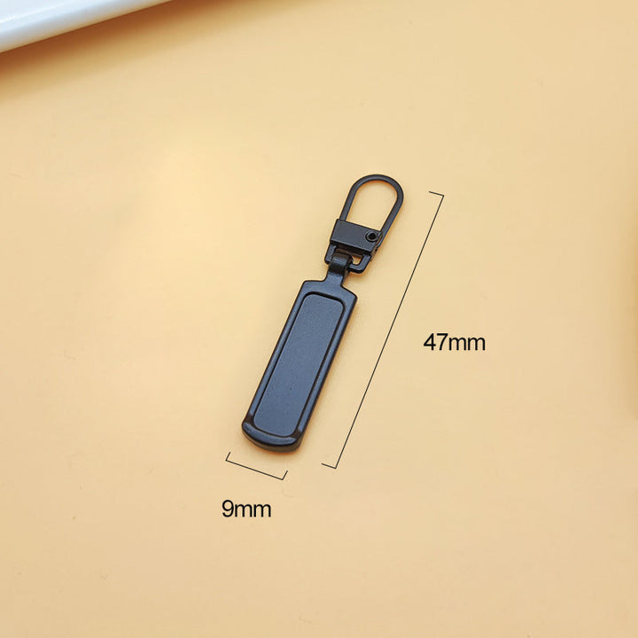 "Universalt avtagbart metallhandtag för dragkedjor, silver, perfekt för kläder och väskor, rektangulärt, robust design."