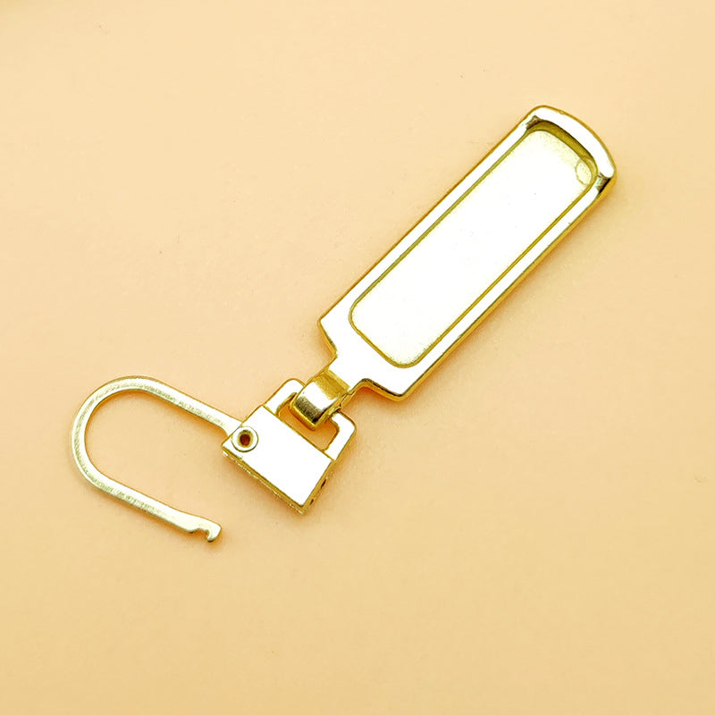 "Universalt avtagbart metallhandtag för dragkedjor, silver, perfekt för kläder och väskor, rektangulärt, robust design."