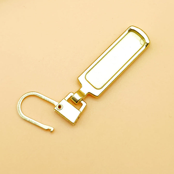 "Universalt avtagbart metallhandtag för dragkedjor, silver, perfekt för kläder och väskor, rektangulärt, robust design."