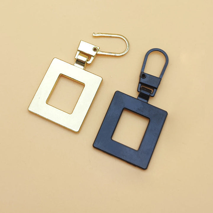 "Universalt avtagbart metallhandtag för dragkedjor, silver, perfekt för kläder och väskor, rektangulärt, robust design."