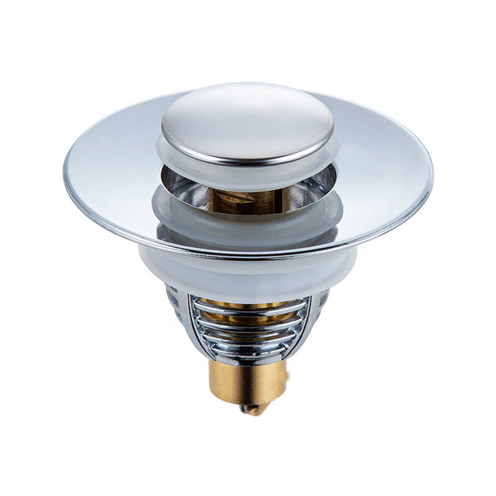 "Universell badrumsavloppspropp i elegant mässing och stål med tryckknapp, silikonringar för säker passform mot smuts."