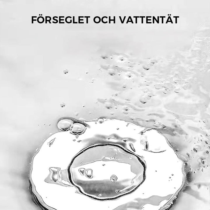 "Universell badrumsavloppspropp i elegant mässing och stål med tryckknapp, silikonringar för säker passform mot smuts."