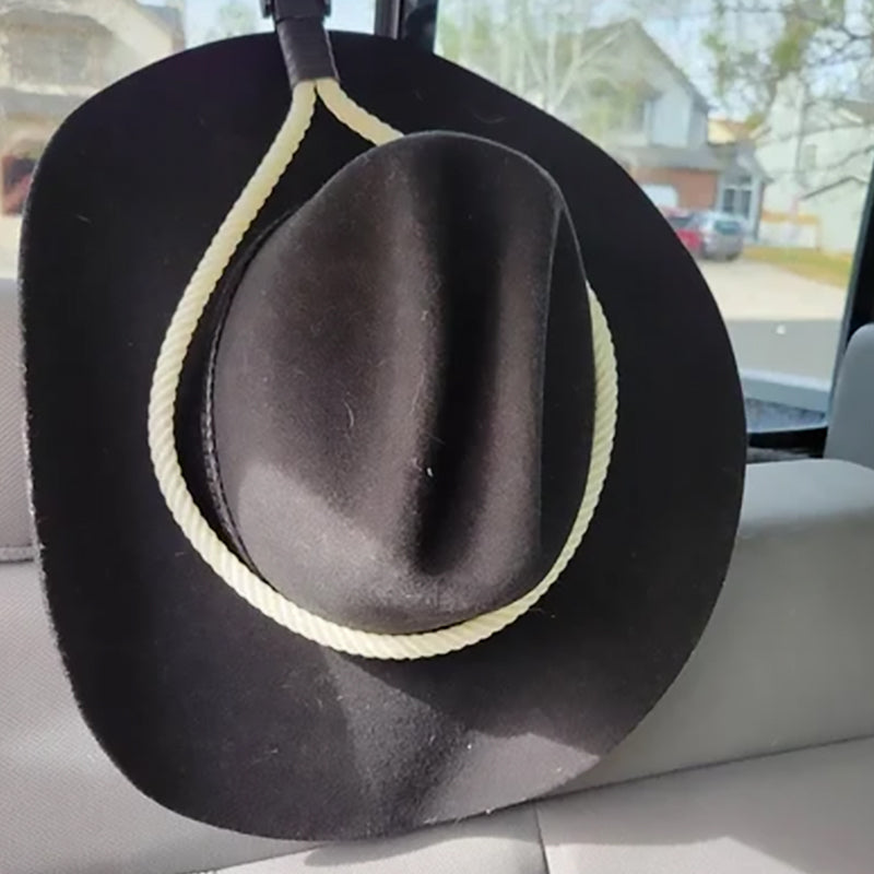 "Universella cowboyhattsfästen i svart och vitt plast, elegant läderrem, monterad i bil eller lastbil med sugkopp."