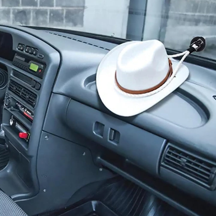 "Universella cowboyhattsfästen i svart och vitt plast, elegant läderrem, monterad i bil eller lastbil med sugkopp."