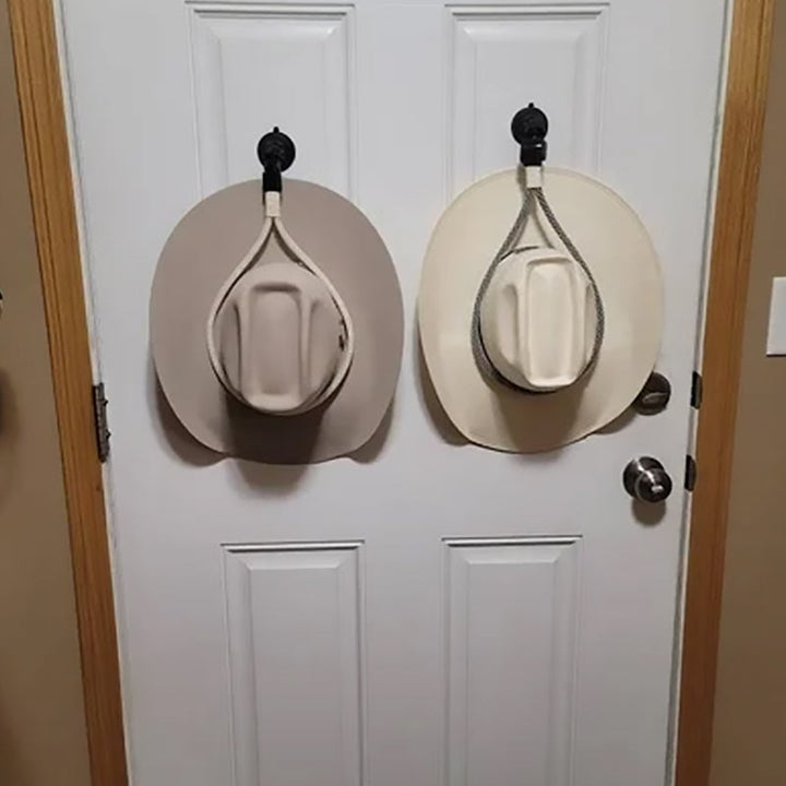 "Universella cowboyhattsfästen i svart och vitt plast, elegant läderrem, monterad i bil eller lastbil med sugkopp."