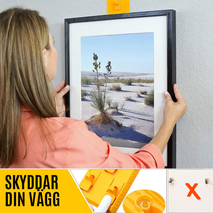 "Universellt fotoramverktyg i ABS med linjal, portabel och lätt, för exakt upphängning av konstverk och foton."