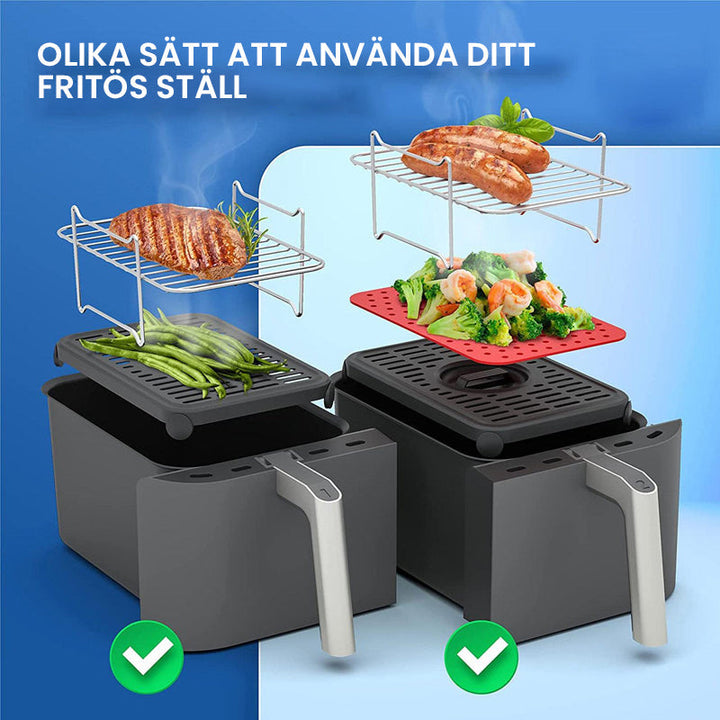 "Universellt grillställ i rostfritt stål, justerbart och diskmaskinsäkert, för ångning och stekning i köket."