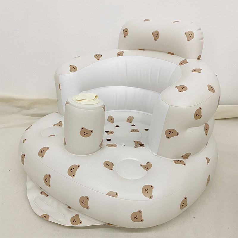 "Uppblåsbar babysoffa med ergonomiskt ryggstöd, i pastellfärger, för barn 3-48 månader, ideal för trygg sittkomfort."