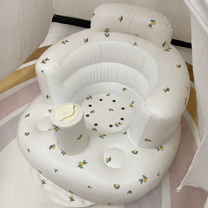 "Uppblåsbar babysoffa med ergonomiskt ryggstöd, i pastellfärger, för barn 3-48 månader, ideal för trygg sittkomfort."