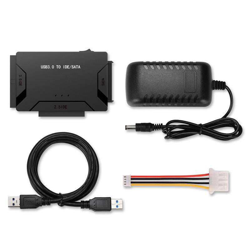"USB 3.0 till IDE/SATA Adapter, svart, kopplad till hårddisk, kompaktdesign, ansluter 2,5 och 3,5 tum enheter, teknik."