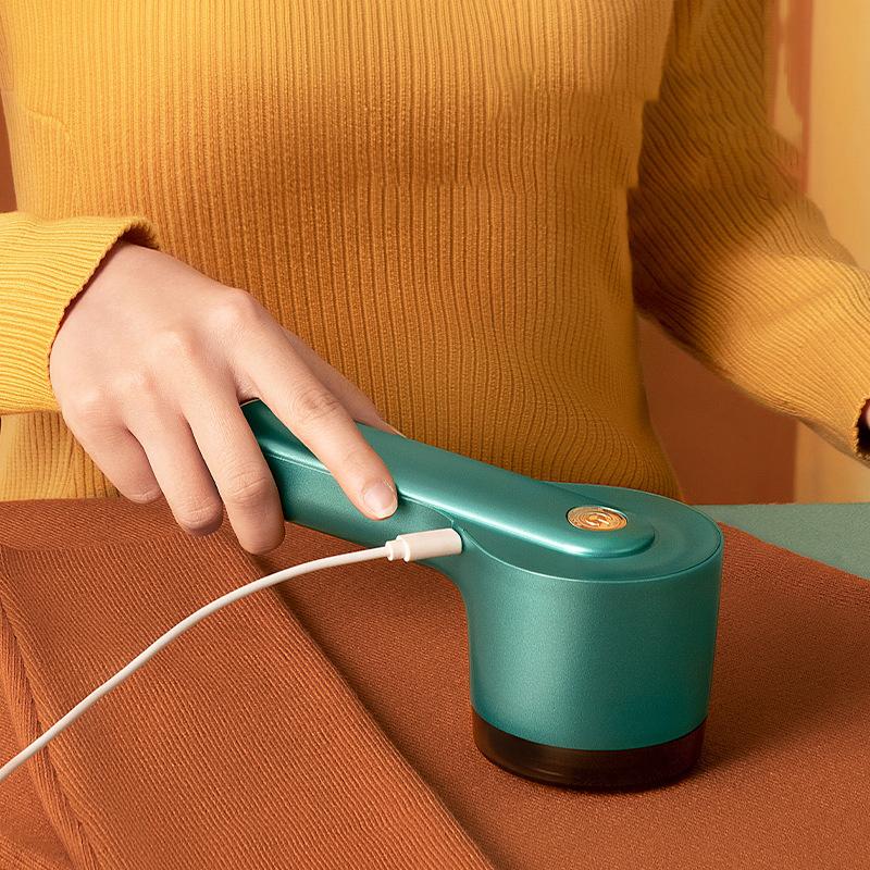 "USB-laddningsbar klädfjun borttagare, grön, enkel design, bioniskt knivnät, uppladdningsbar för alla tygtyper."