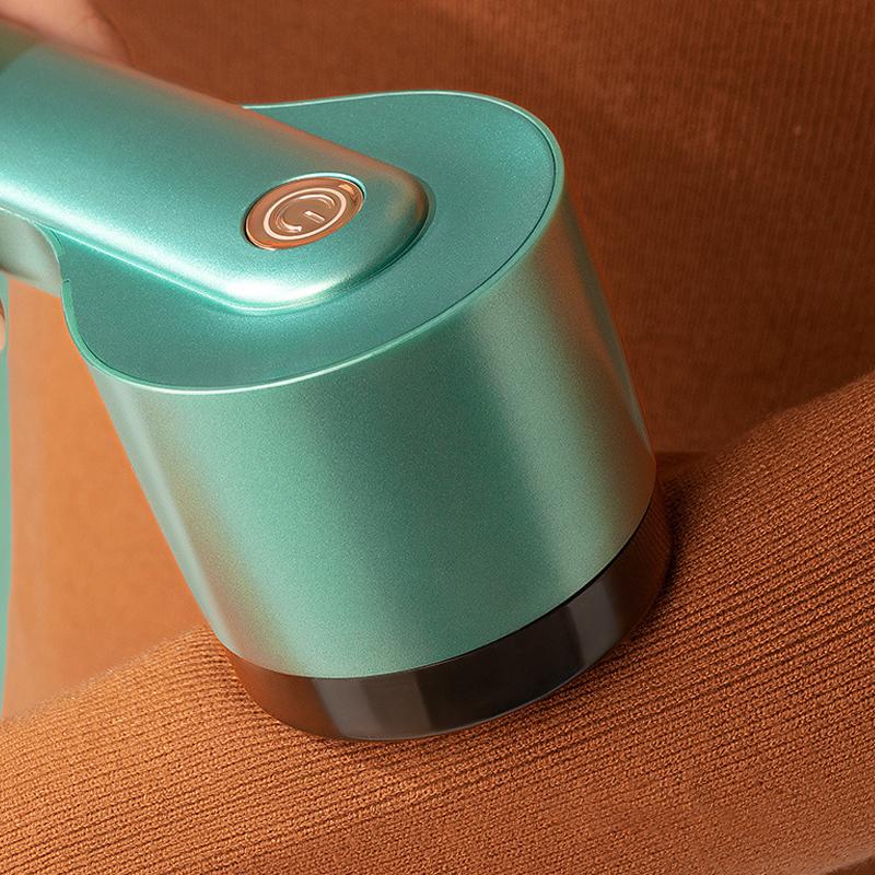"USB-laddningsbar klädfjun borttagare, grön, enkel design, bioniskt knivnät, uppladdningsbar för alla tygtyper."
