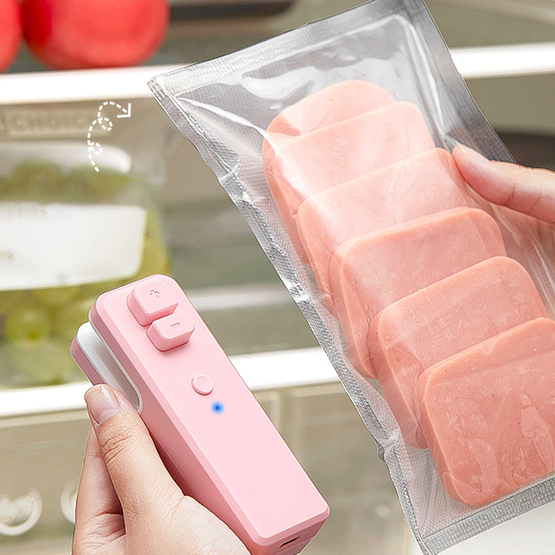 "USB-uppladdningsbar miniförseglare för kök, kompakt design, vit färg, för plastsäcksförsegling och skärning"
