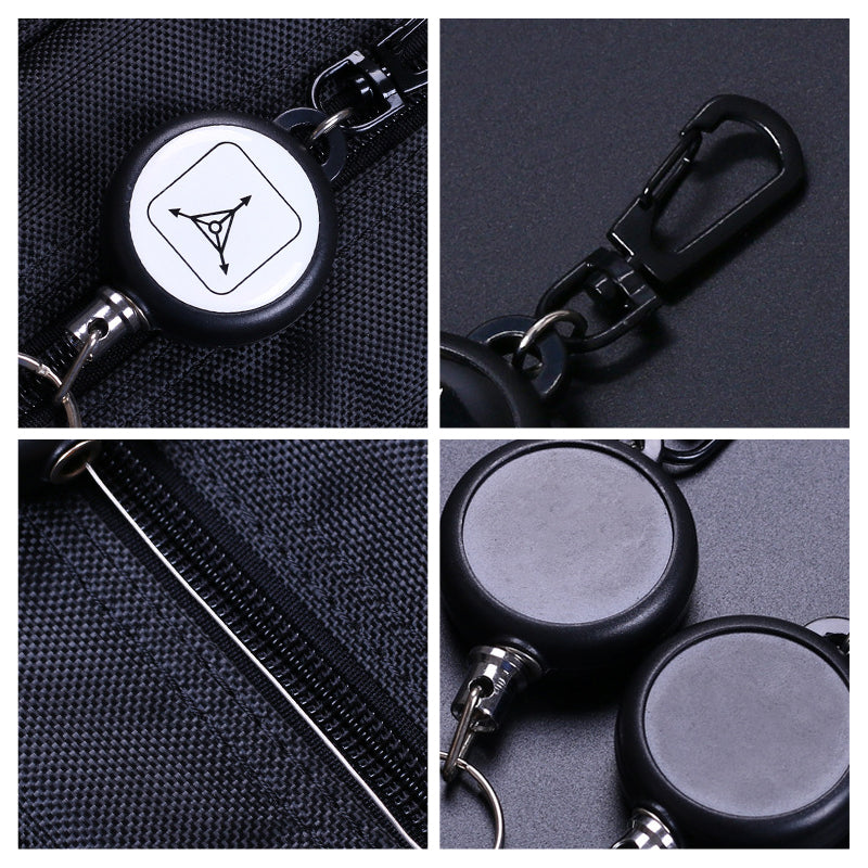 "Utdragbar nyckelring i metall med 60 cm stark stållina, perfekt för bälte eller ryggsäck. Slitstarkt och praktiskt tillbehör