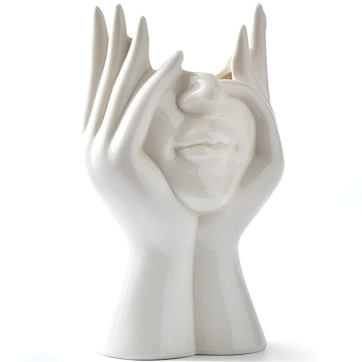 Konstnärlig designvas med ansikte, modern skulptural dekor för ett stilfullt hem.