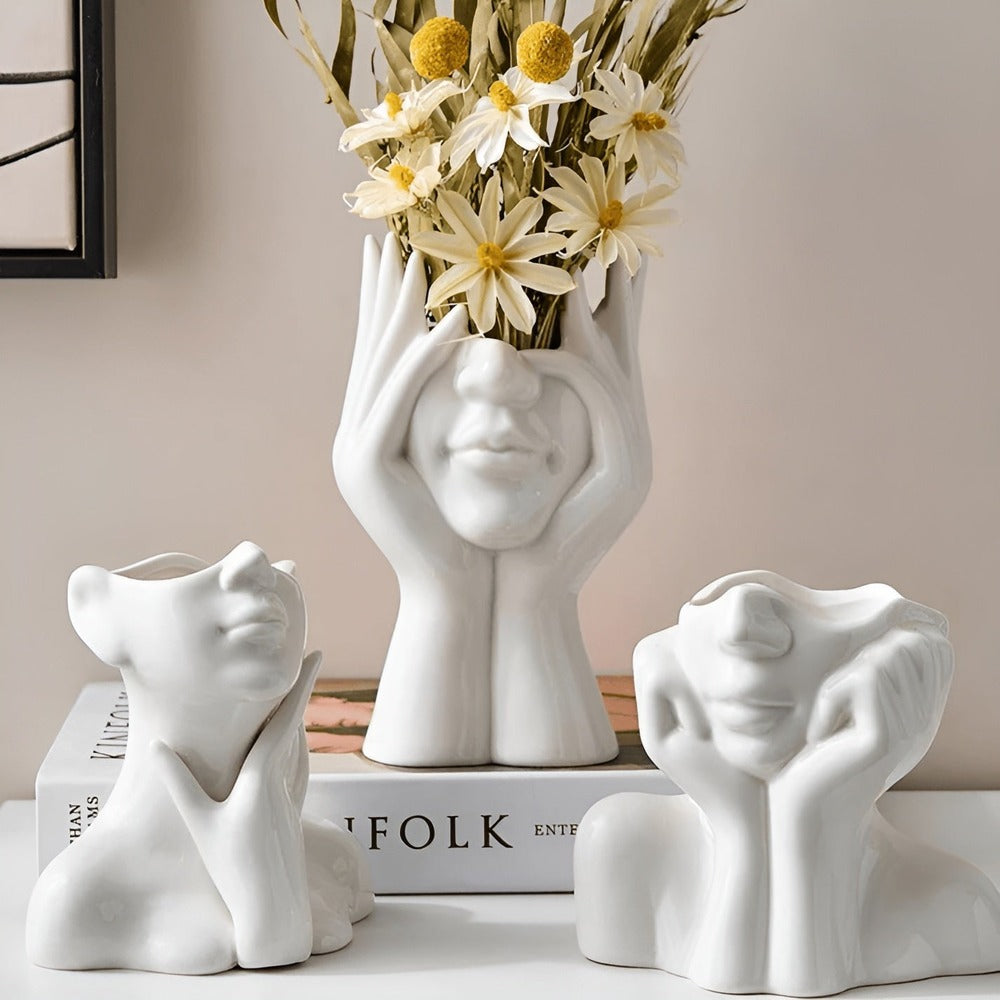 Modern designvas med ansikte, elegant och uttrycksfull dekor för stilfull inredning.