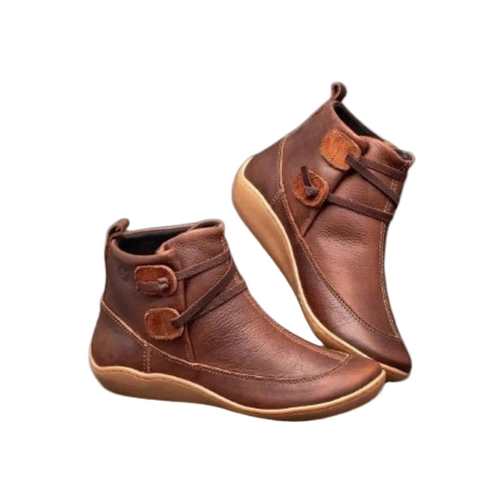 Vågade svarta ankelboots för kvinnor med elegant remdetalj och låg klack