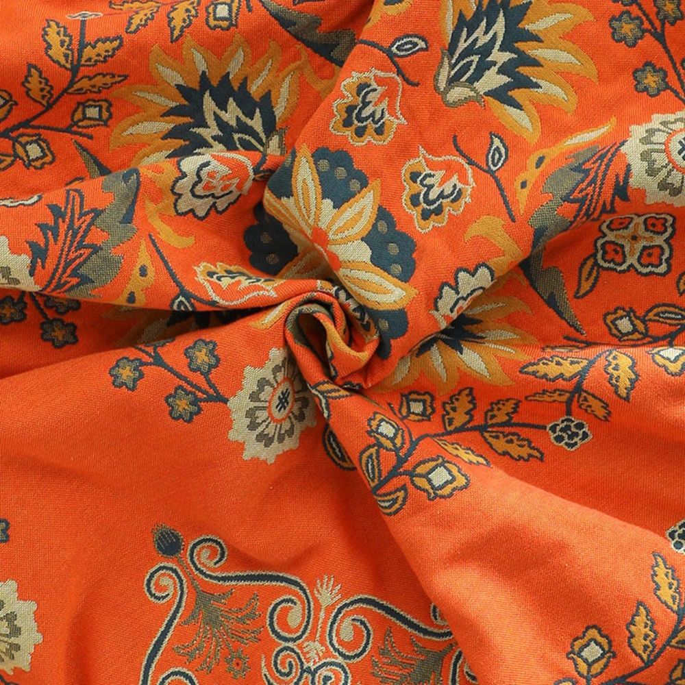 Stilren Marigold pläd, vändbar filt för sovrum och vardagsrum. Skapar mysig atmosfär med flerfärgad textil.