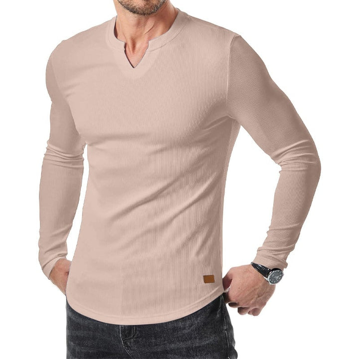 "V-ringad långärmad muskelskjorta för män med slim fit, framhäver kroppens fysik med modern design och komfort."