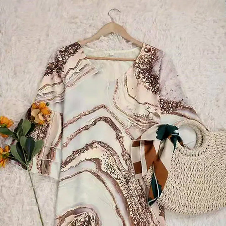 "Vacker sommarklänning med klockärmar, blommigt mönster, feminin och elegant design för kvinnor"