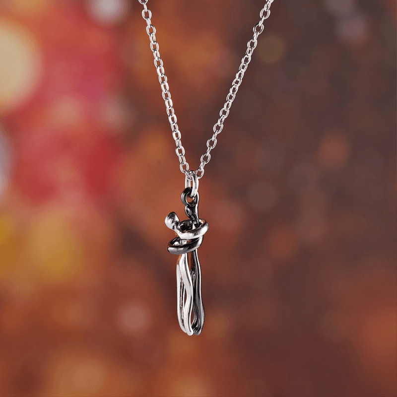 "Vackert par kram halsband i koppardesign, symboliserar evig kärlek och sammanhållning för älskare."