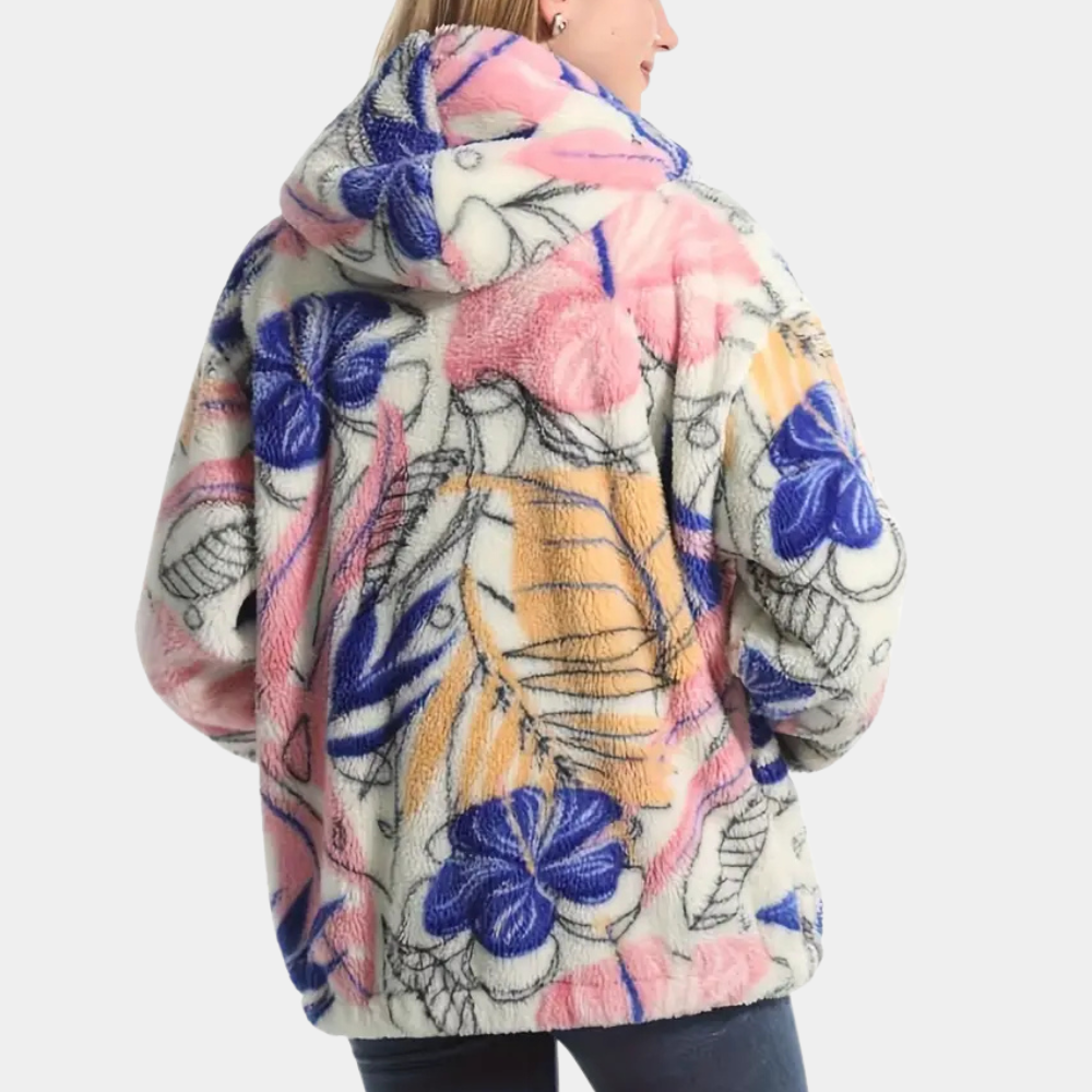 Elegant höstjacka för dam med huva och detaljerat blommönster. Varmt ytterplagg i stilren design.