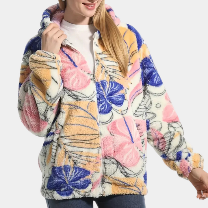 Trendig dam vinterjacka med vackert blommönster & praktisk huva. Varmt & mode ytterplagg för stil.