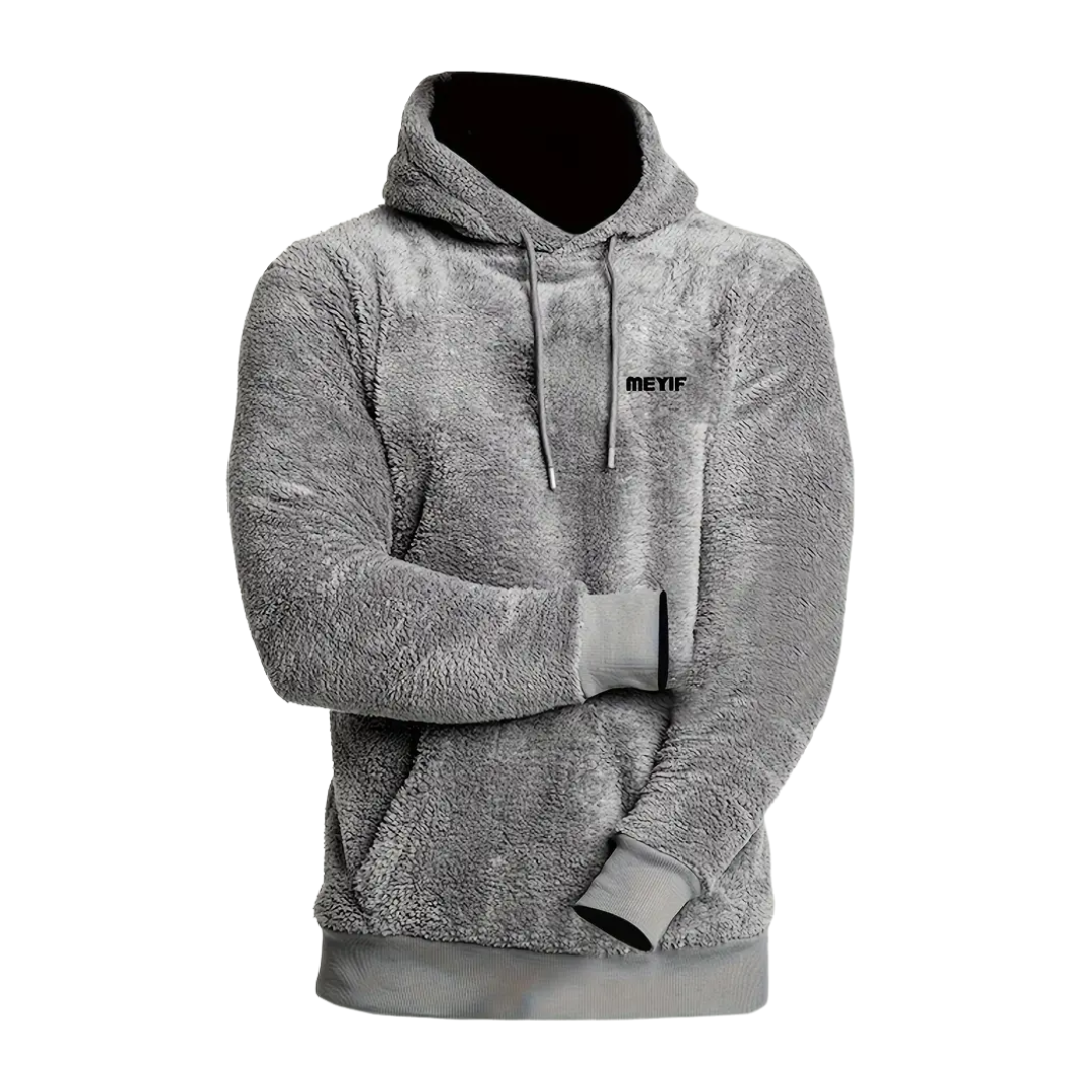 Stilren herr hoodie med huva och mjukt foder. Idealisk som varm pullover för höstens och vinterns mode.