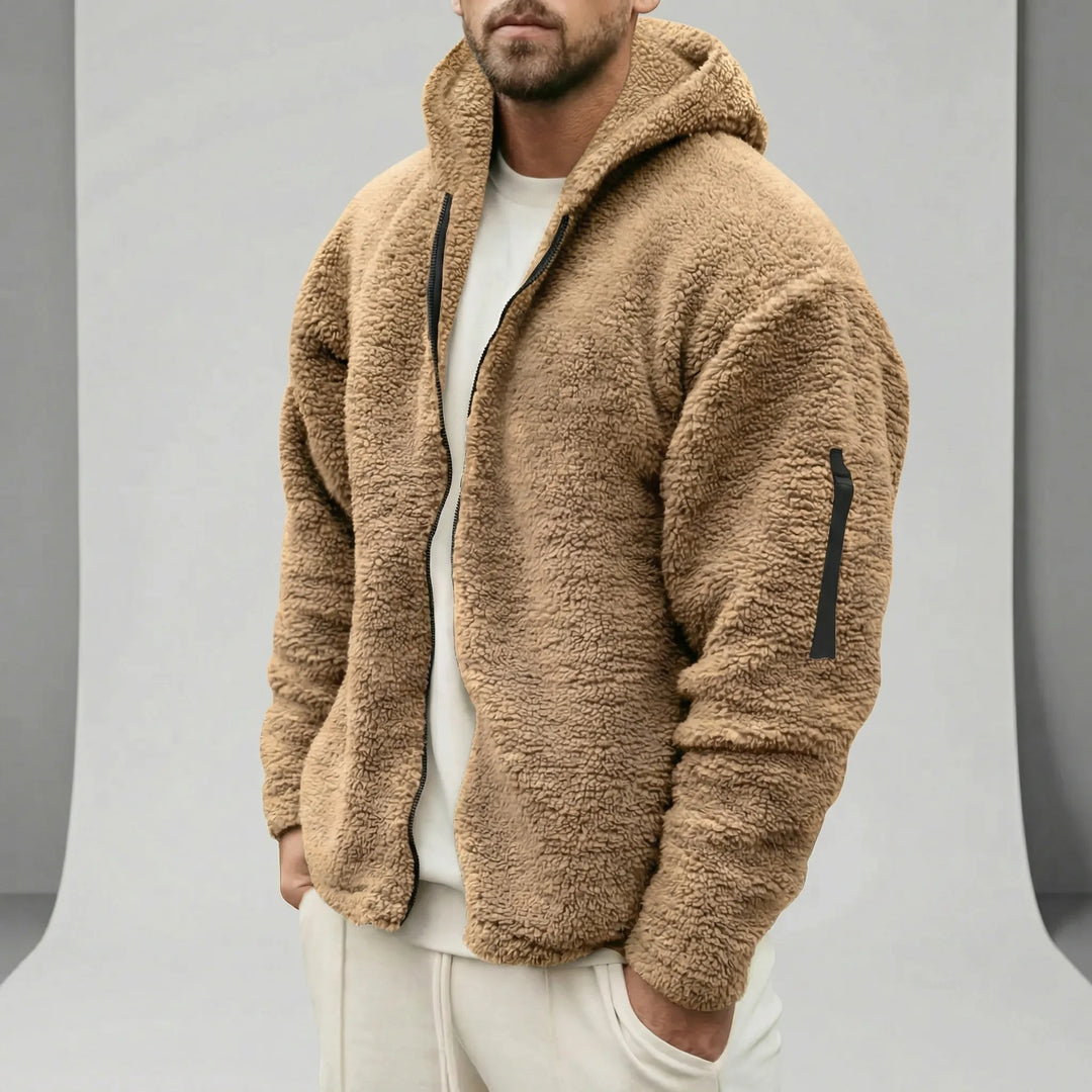 Bekväm mörkblå herr vinterjacka Joshua med hel dragkedja och värmande huva. Stilren design.