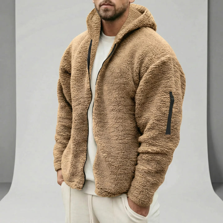 Bekväm mörkblå herr vinterjacka Joshua med hel dragkedja och värmande huva. Stilren design.