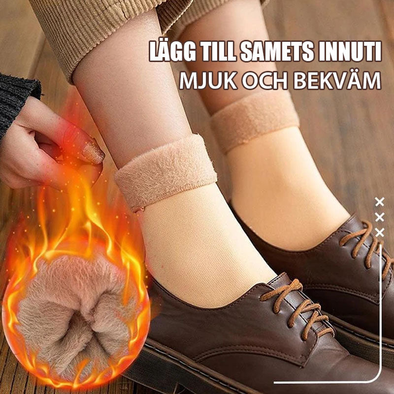 Värmande vinterstrumpor för kvinnor i mjukt sammet med fluffigt innerfoder och universell passform, grå färg.