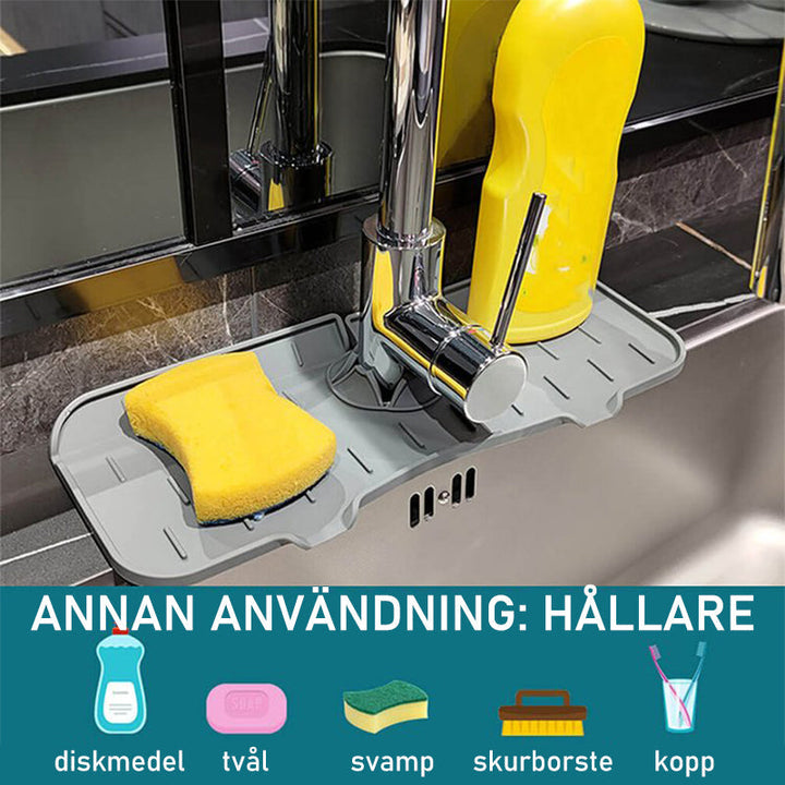 Vattenabsorberande silikonmatta för kök, vit, passar runt kran, fångar vattendroppar, håller bänkskivan torr.