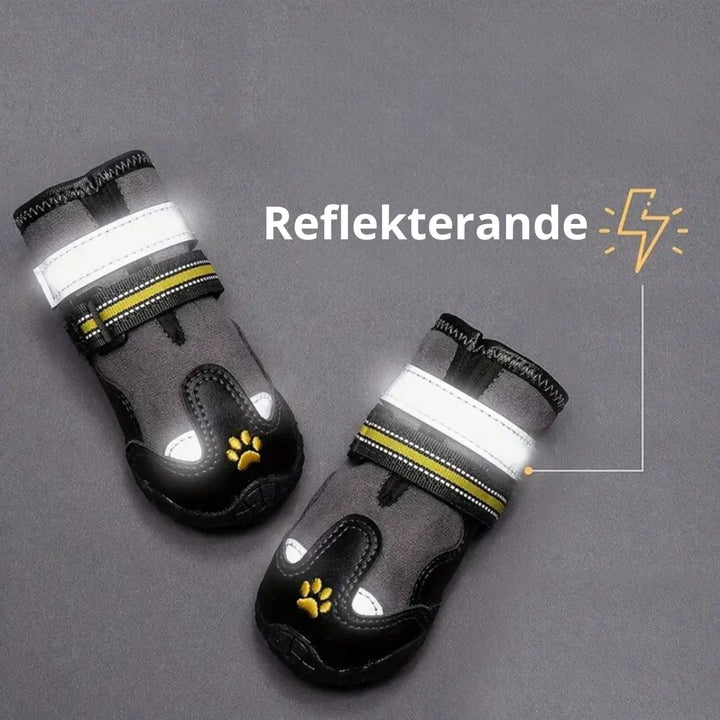 Robust tasskydd för hundar på vintern. Reflekterande och vattentäta hundskor mot snö och is.