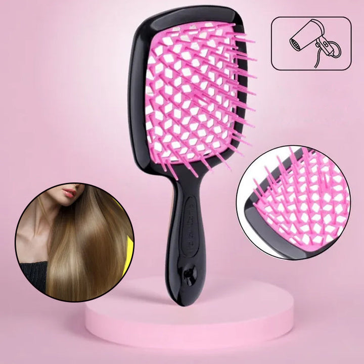 "Ventilerad avtrasslande hårborste i grönt, rosa, rött, svart, vitt. Effektiv för trasselfritt hår. Beauty & Wellbeing."