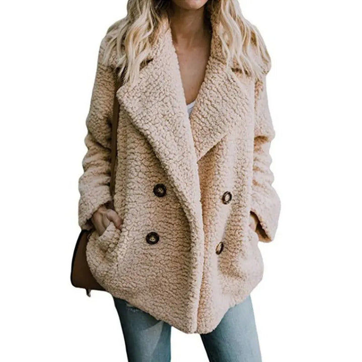 "Överdimensionerad fluffig fleecejacka dam i teddystil, beige med mjukt material och avkopplande passform för vinterbruk."