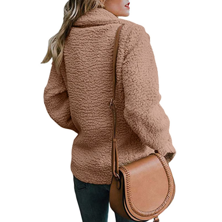 "Överdimensionerad fluffig fleecejacka dam i teddystil, beige med mjukt material och avkopplande passform för vinterbruk."