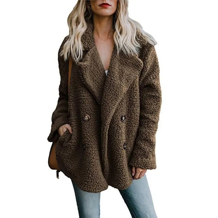 "Överdimensionerad fluffig fleecejacka dam i teddystil, beige med mjukt material och avkopplande passform för vinterbruk."