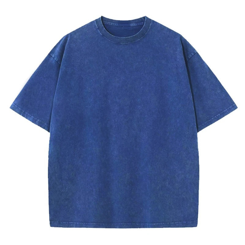 "Överdimensionerad lös T-shirt för män i svart bomull, visad framifrån med o-ringad krage, perfekt för avslappnad stil."